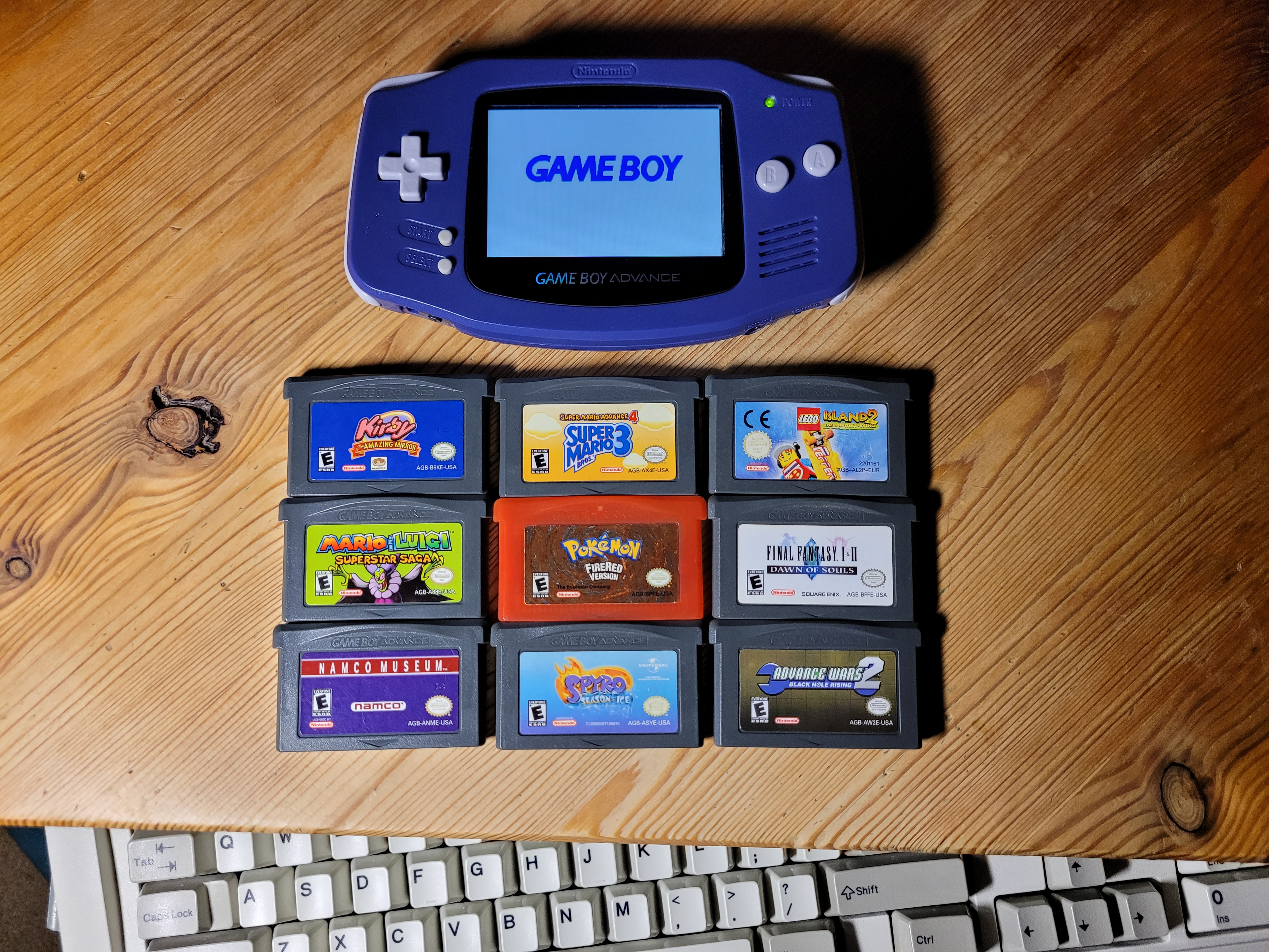 Picture of the full collection of my GBA games as of December
                            2023.